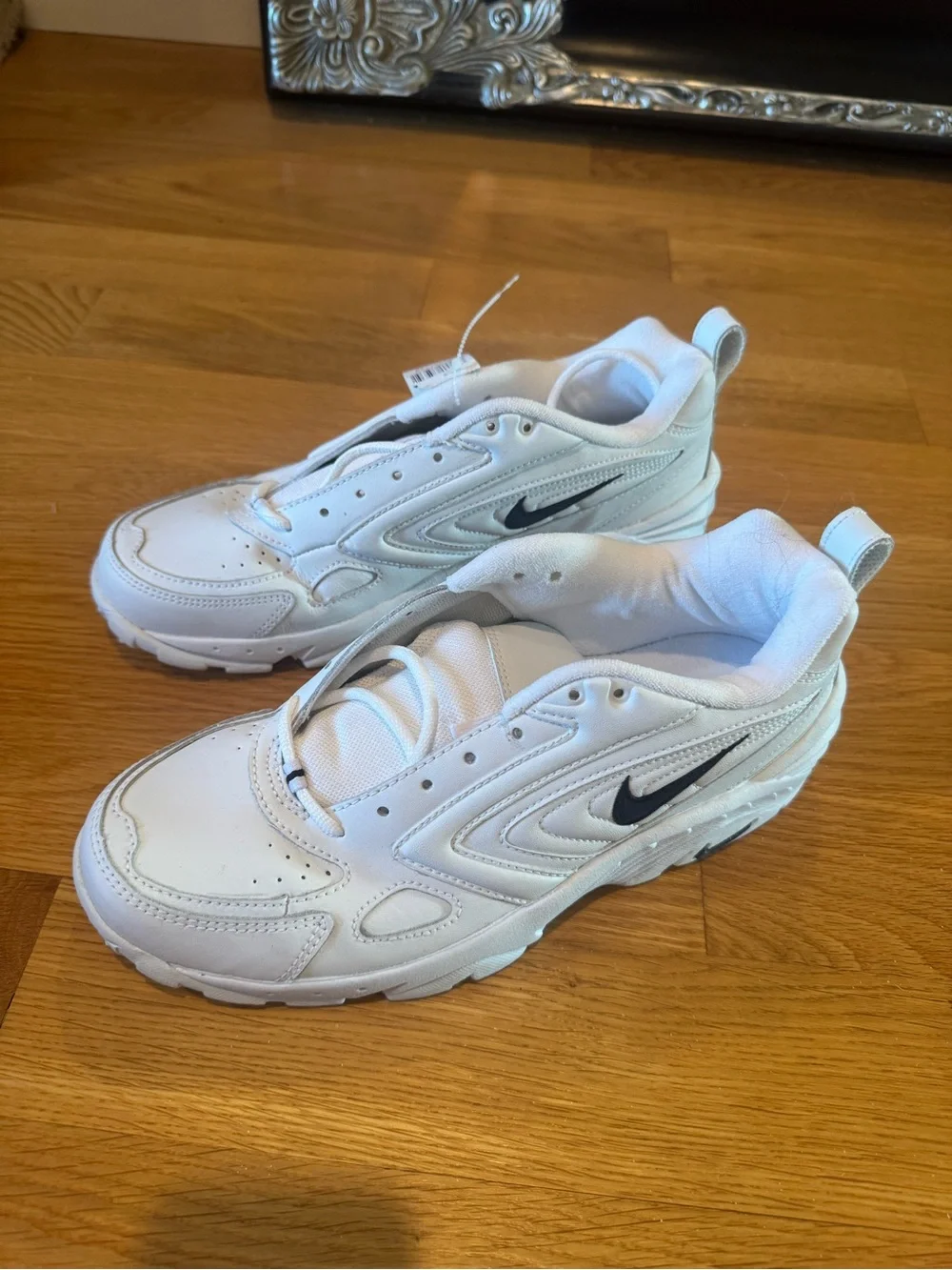 Nike Men’s White Sneakers with dark navy Swoosh